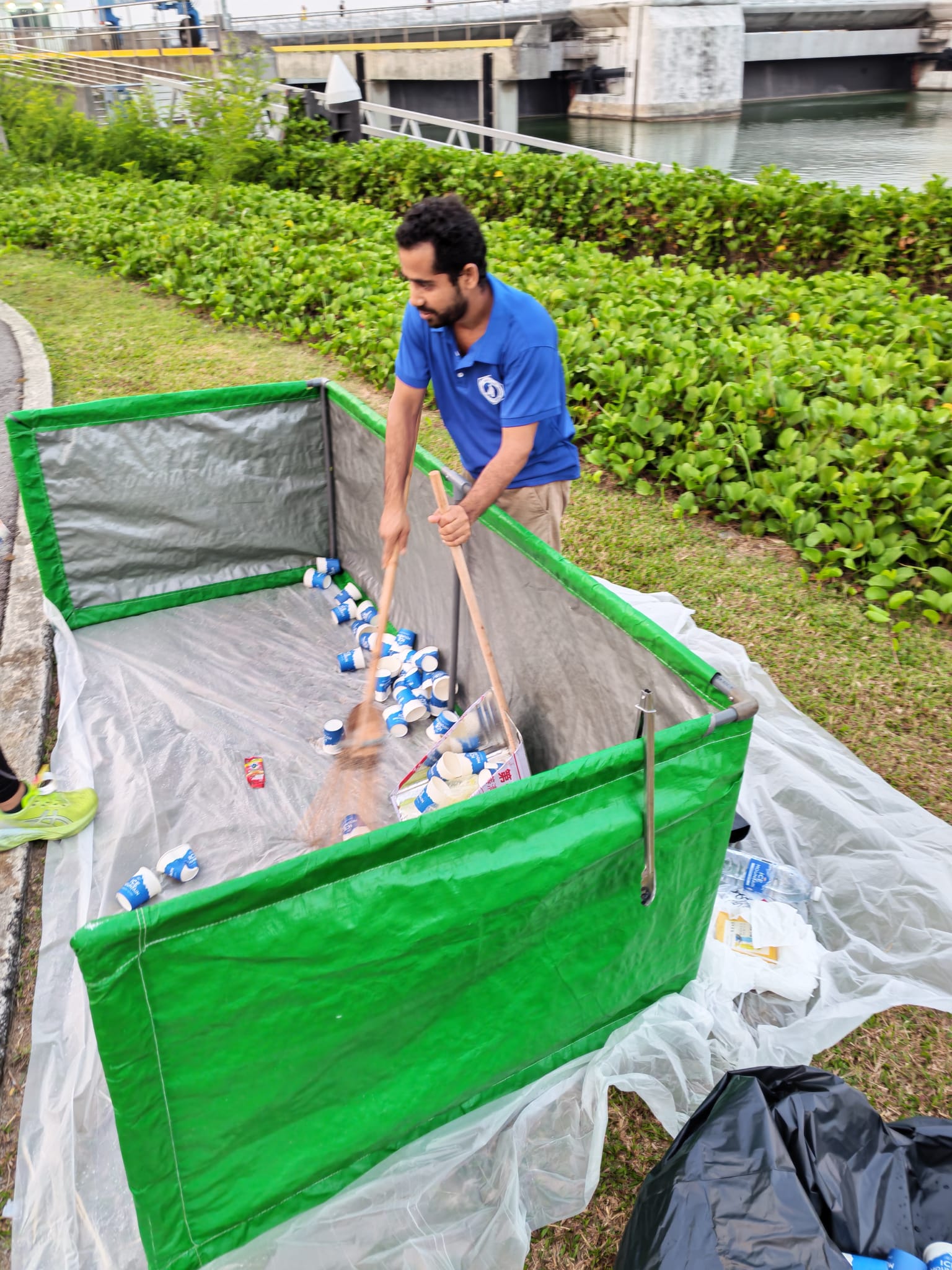Spyder event cleaning team using a large-capacity collection bin