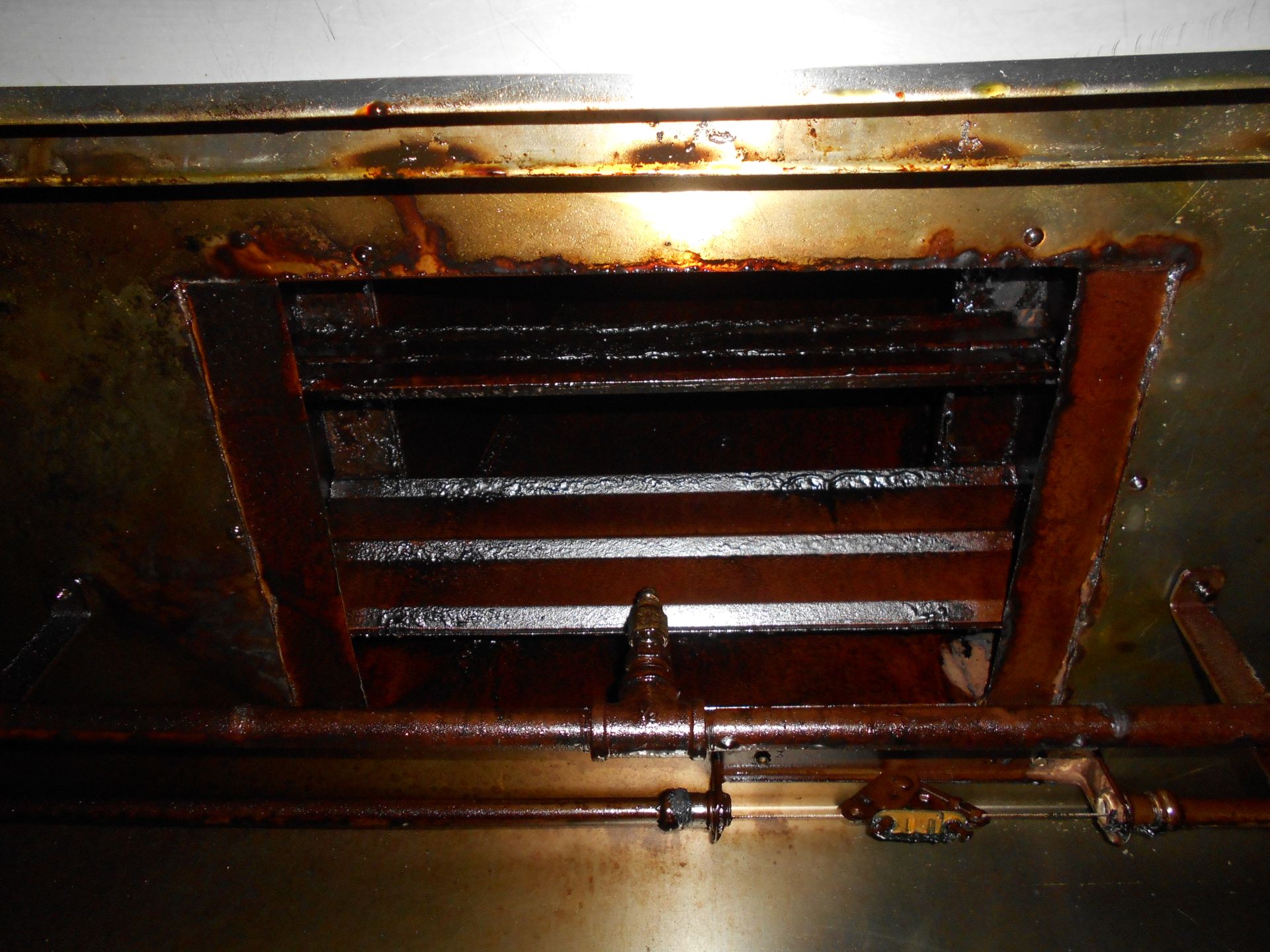Kitchen hood plenum before cleaning